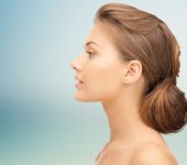 profile of a beautiful young-looking woman after face and neck rejuvenation