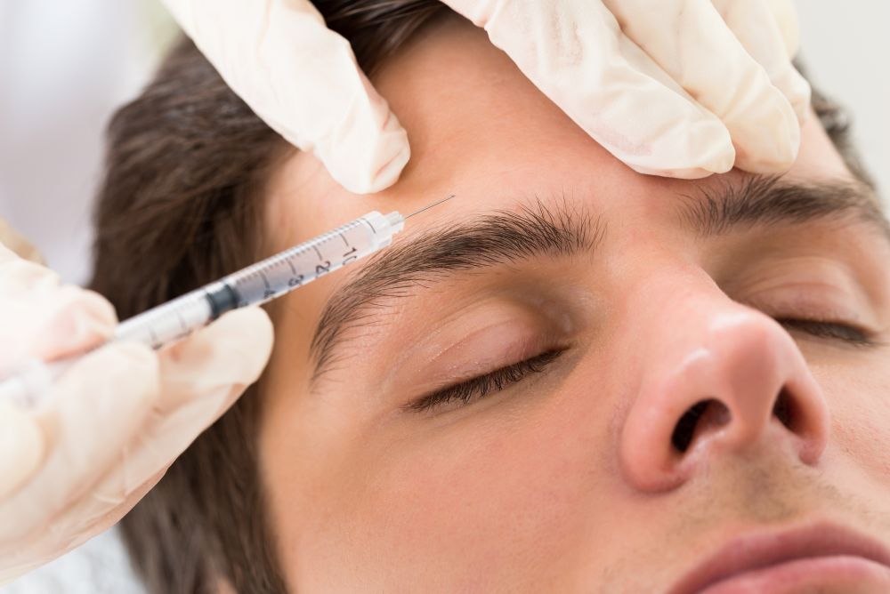 Young Man Having Botox Treatment